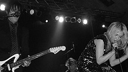 Sweethead in 2009. Pictured: Troy Van Leeuwen (left) and Serrina Sims (right).