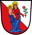 Gemeinde Gessertshausen Auf von Rot und Silber schräggeteiltem Schild eine stehende, goldengekrönte und nimbierte Madonna in blauem Mantel und rotem Kleid, auf dem rechten Arm das Kind, in der Linken einen Rosenzweig haltend.
