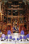 Retablo mayor de la iglesia de Santa Ana (Sevilla), del pintor Pedro de Campaña y el escultor Pedro Delgado (1557).[153]​