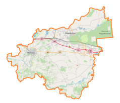 Mapa konturowa powiatu wielickiego, po prawej znajduje się punkt z opisem „Kłaj”