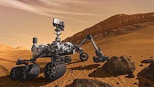 Ровер истражује на површини Марса.