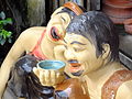 Image 8Vietnamese statues depicting the traditional practice of teeth blackening (nhuộm răng đen) (from Culture of Vietnam)