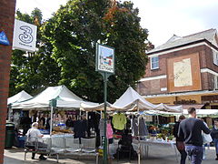 Sunday market and the Eltham town sign