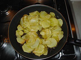 Potatoes being fried