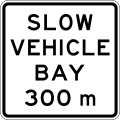 (A42-4/IG-9) Slow Vehicle Bay Ahead (in 300 metres)