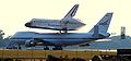 Space Shuttle Atlantis rides atop modified Boeing 747. Parked on tarmac overnight at Offutt Air Force Base, Nebraska in route back from landing at Edwards AFB