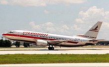 Aircraft takeoff, twinjet airliner tilted as it leaves the runway