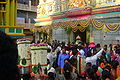 Devotees leaving the temple premises after finishing aarthi depotsava.