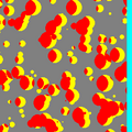 Érosion par h(10 pixels) sur un ensemble Booléen de disques (X :jaune et rouge, érosion par h : rouge, érosion du masque : cyan)
