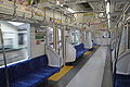 Interior view of set 51004 showing newer seat style and conventional handrails at the doorways in March 2010