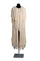 A fringed evening cape, c.1925