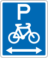 (R6-52.1) Cyclists Parking (on both sides of this sign)