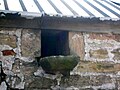 Owl hole at Roughwood Farm, Scotland.