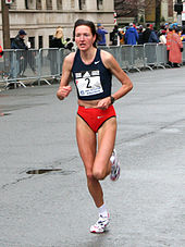 A photo of Jelena Prokopcuka running in a road race