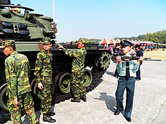 Soldiers removing machine guns from a CM-12