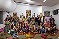 Diamond Way Buddhism practitioners posing in front of an altar