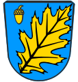 Gemeinde Aystetten In Blau ein schräglinkes goldenes Spitzeneichenblatt, rechts oben schwebend eine goldene Eichel.