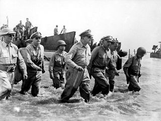 General Douglas MacArthur (center) had declared, “I shall return,” when he escaped from advancing Japanese forces in the Philippines in 1942. Two years later, he made good on his promise and waded ashore at Leyte as American forces began the liberation of the Philippines.