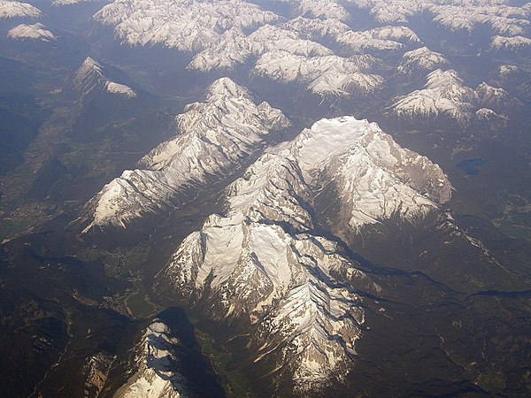 Mountain ranges Mieminger Kette (left) and Wettersteingebirge with Zugspitze.