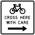 (A43-3) Cyclists Cross Here With Care (to the right)