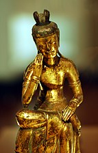 Pensativo Bodhisattva Maitreya. Tres Reinos de Corea, siglo VII. Bronce dorado, altura con pedestal 31 cm. Museo Nacional de Tokio.
