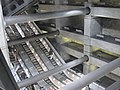 Image 13Escalators at Westminster Underground station descend between beams and columns of the station box to reach the deep-level Jubilee line platforms.