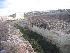 Looking down the left hand ditch of the battery, with the left caponier nestling in the ditch.