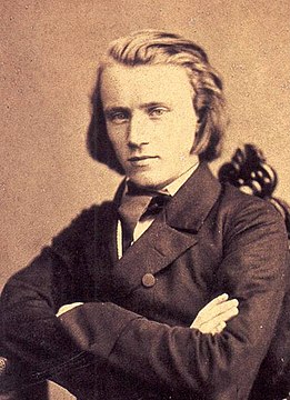 "Johannes_Brahms_1853.jpg" by User:Meister Raro~commonswiki