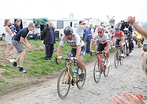 Peter Sagan, Silvan Dillier and Jelle Wallays at the Templeuve-en-Pévèle pavé sector, 35 kilometre (22 mil) from the finish