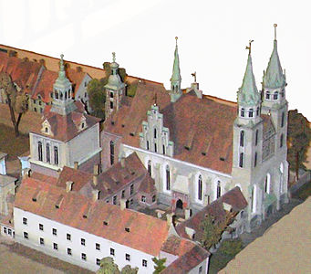 Vrhovna župnijska cerkev z dvostolpno fasado iz leta 1538 s severnimi sosednjimi deli Berlinske palače. Miniatura, prikazana v sedanji cerkveni stavbi.
