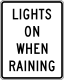 Zeichen R16-6 Licht an bei Regen. Generelles Gesetz in vielen Staaten, Schilder befinden sich meist an Grenzen.