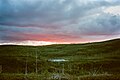 Sunset over burned forest plateau in Otish Mountains