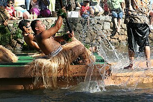 Rower in a traditional canoe at the Polynesian Cultural Center