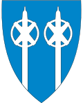 Kommunevåpenet i Trysil, hvor to skistaver symboliserer bygdas skihistorie.