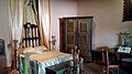 Recreation of a room of a criollo house with furniture of the time.