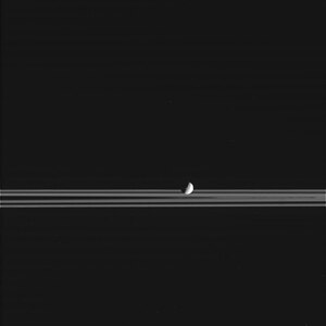 Cassini's image of Mimas passing in front of Saturn's rings, imaged on February 20, 2005.[39]