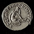 Trajan Denarius, Roman Dacia, 107 AD - Reverse. Image:Dacian wearing peaked cap, seated on shield in mourning, with falx below. Text: "SPQR OPTIMO PRINCIPI", abbreviation from "Senatus Populus Que Romanus. Optimo Principi"