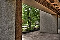 A view of the grounds from an outdoor walkway on the ground level of the Humanities Centre of the University of Alberta