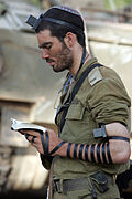 Jewish IDF soldier prays