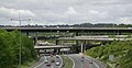 Image 2The multi-level junction between the M23 and M25 motorways near Merstham in Surrey. The M23 passes over the M25 with bridges carrying interchange slip roads for the two motorways in between.
