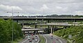 Image 46The multi-level junction between the M23 and M25 motorways near Merstham in Surrey. The M23 passes over the M25 with bridges carrying interchange slip roads for the two motorways in between.