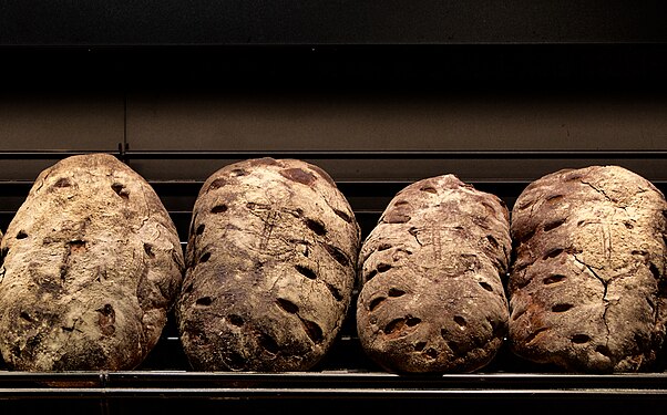 4 loaves of bread on the shelf