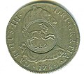 Anverso de moneda de 8 reales (plata) de Carlos III de 1786 resellada en Catar.