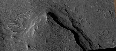 Close view of edge of layered mesa, as seen by HiRISE