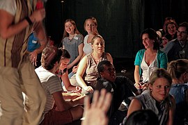 Participants engage with typical urban slum challenges in the Struggle for Survival London 2012. (7904125486).jpg