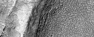 High-center polygons, as seen by HiRISE under HiWish program. Image is of the top of a debris apron in Deuteronilus Mensae.