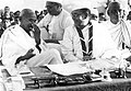 With Mohandas Gandhi (left) at the Indian National Congress annual meeting in Haripura in 1938.