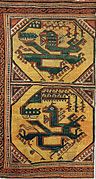 Phoenix and Dragon carpet, 164 cm × 91 cm (65 in × 36 in), Anatolia, circa 1500, Museum of Islamic Art, Berlin, Inv. No. I.4