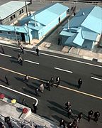 Representatives cross back over to Panmunjom, Republic of Korea, after the departure of South Korean business tycoon Chung Ju-yung 981027-F-XT789-535.jpg