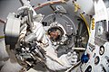 A "fish-eye" lens was used to record this image of astronaut Ron Garanin the Quest Airlock who was about to begin the mission's third scheduled spacewalk.